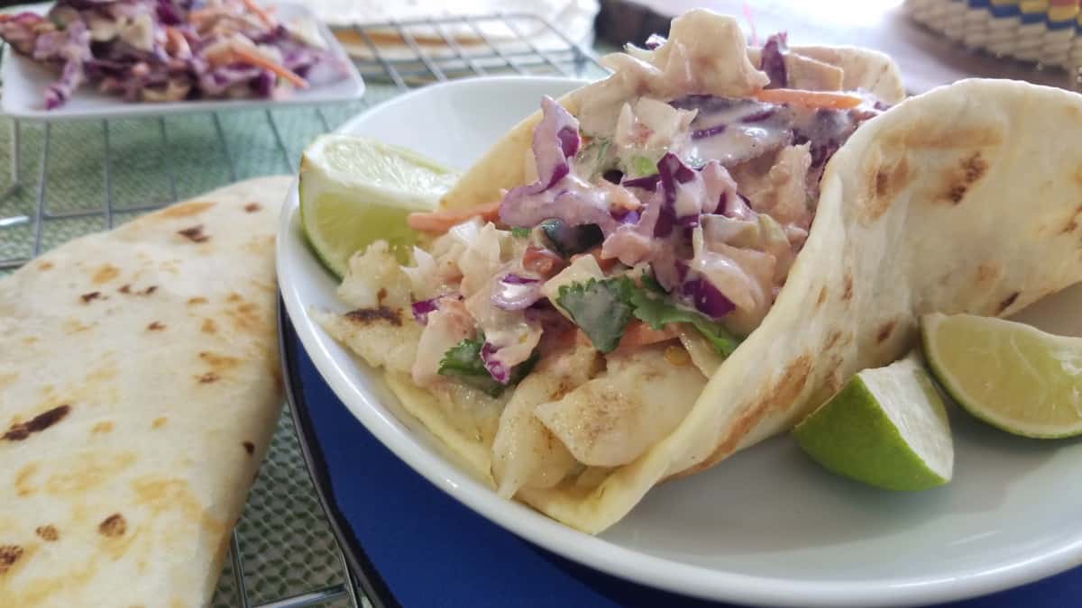 Halibut tacos made with BUENO® flour tortillas and salsa verde